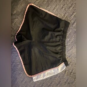 Good condition; black, white, and baby pink athletic shorts; Adidas brand